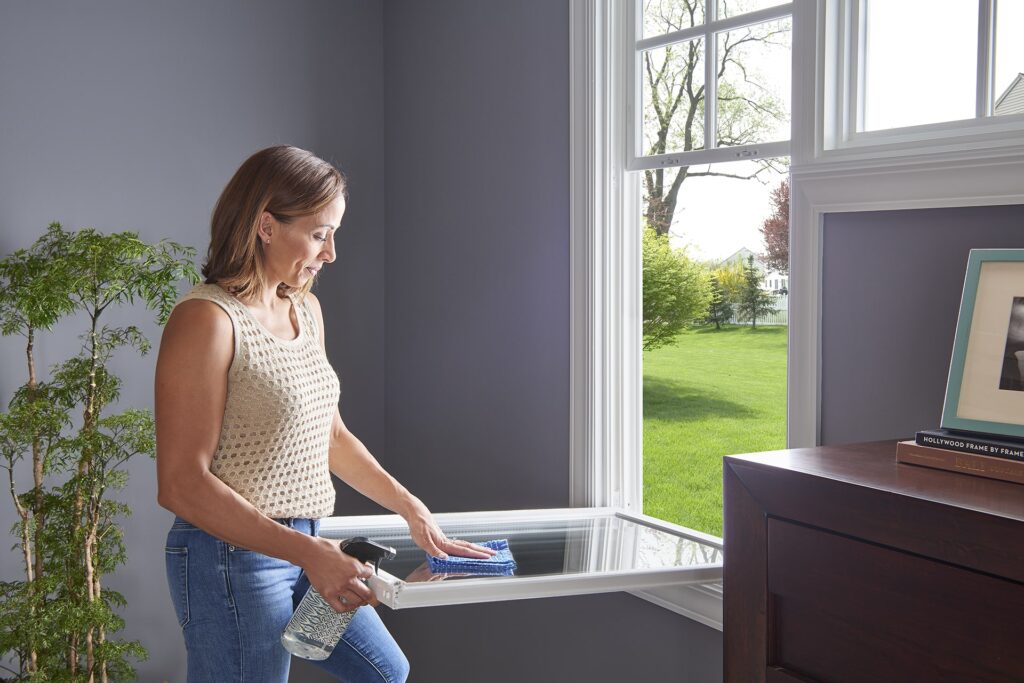 Cleaning double hung window