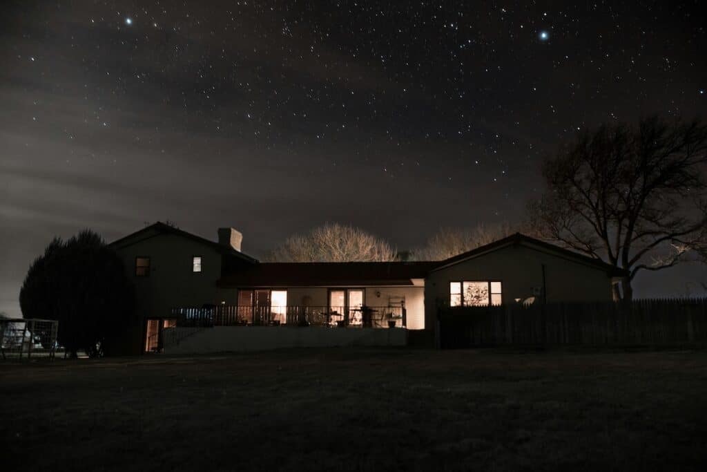 ranch-style home at night